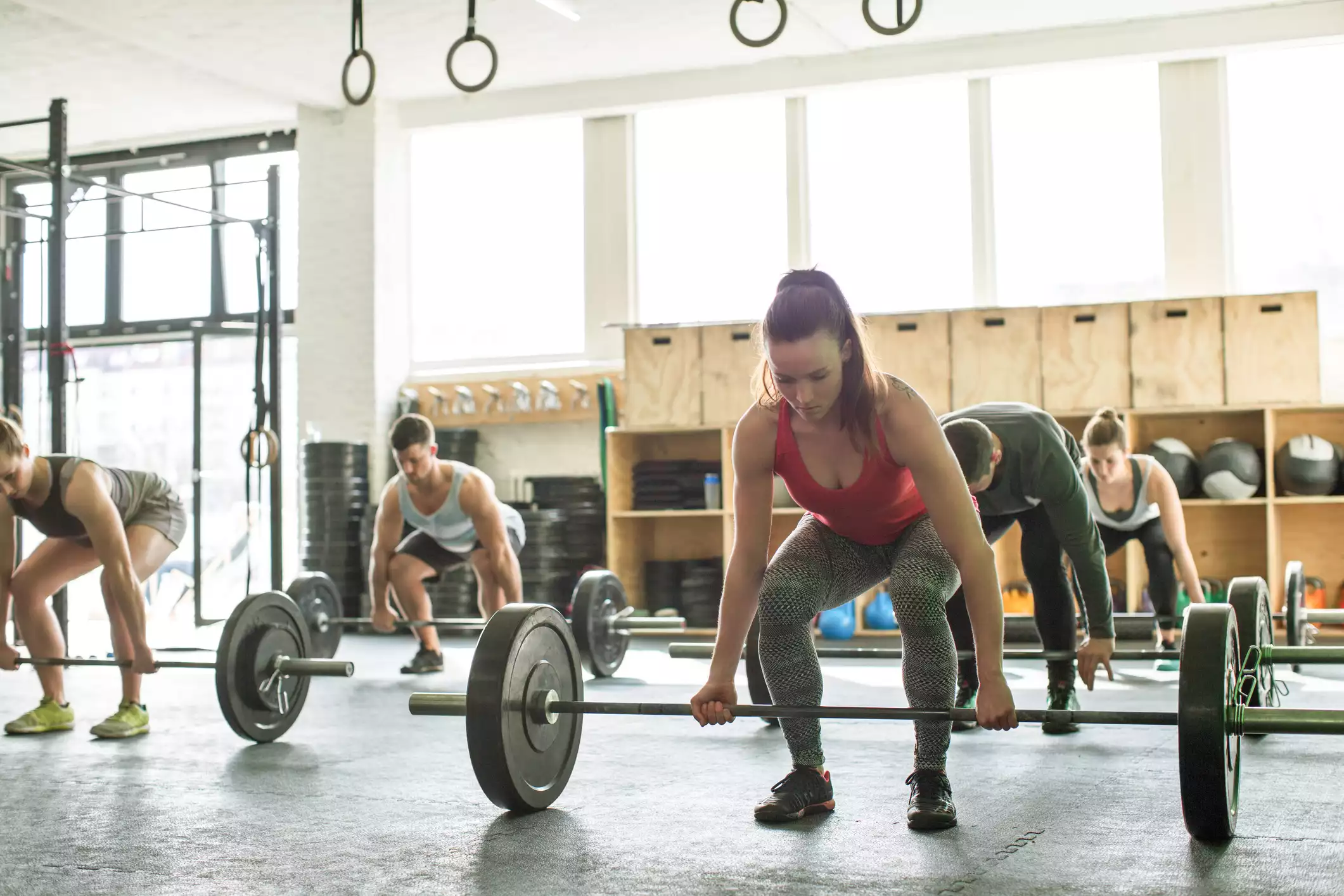 Group of people doing clean and press