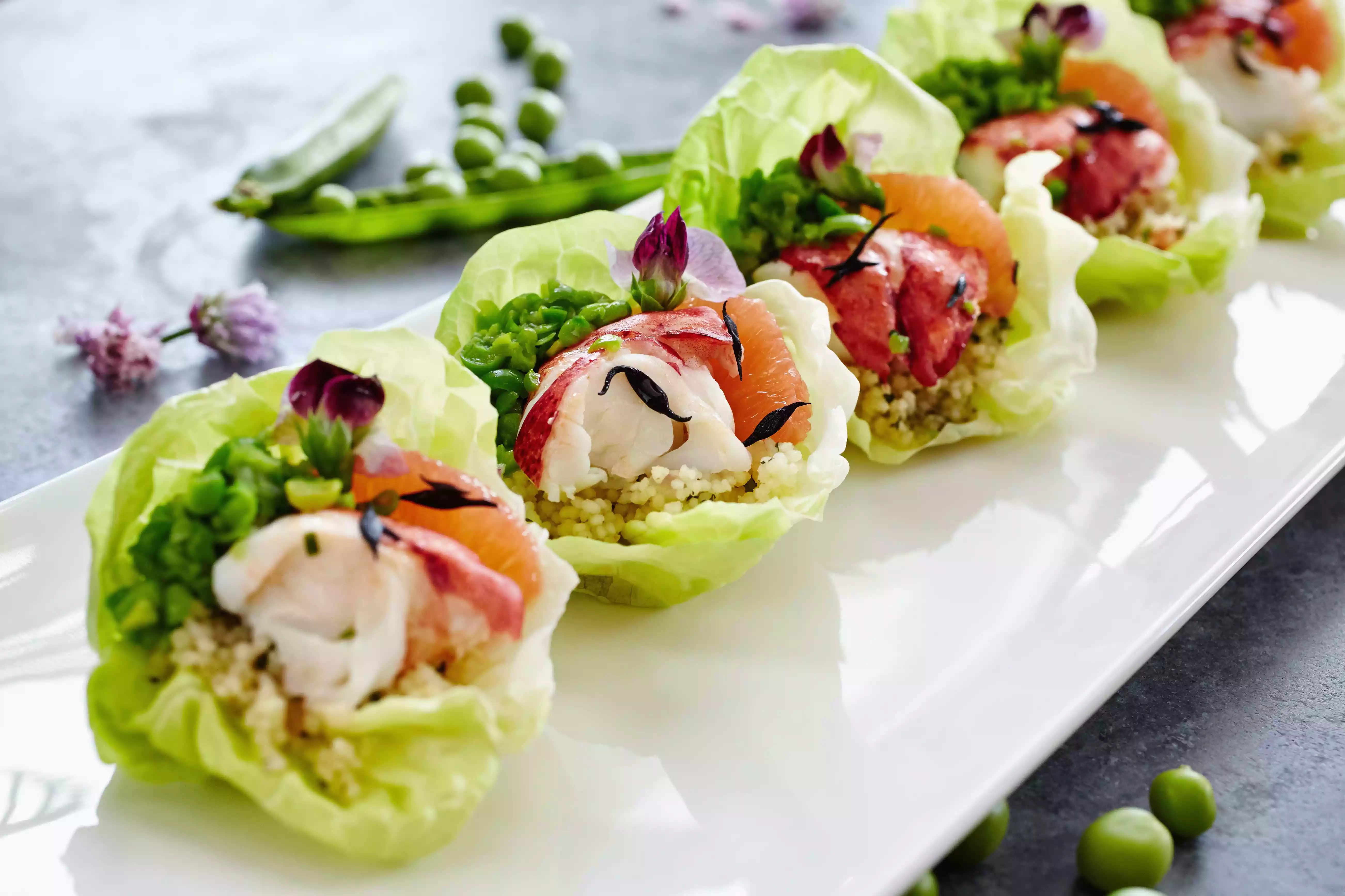 Close up of fresh seafood salad in lettuce cups