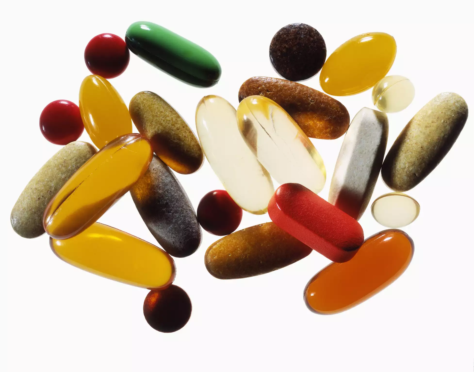 assorted vitamins on white background