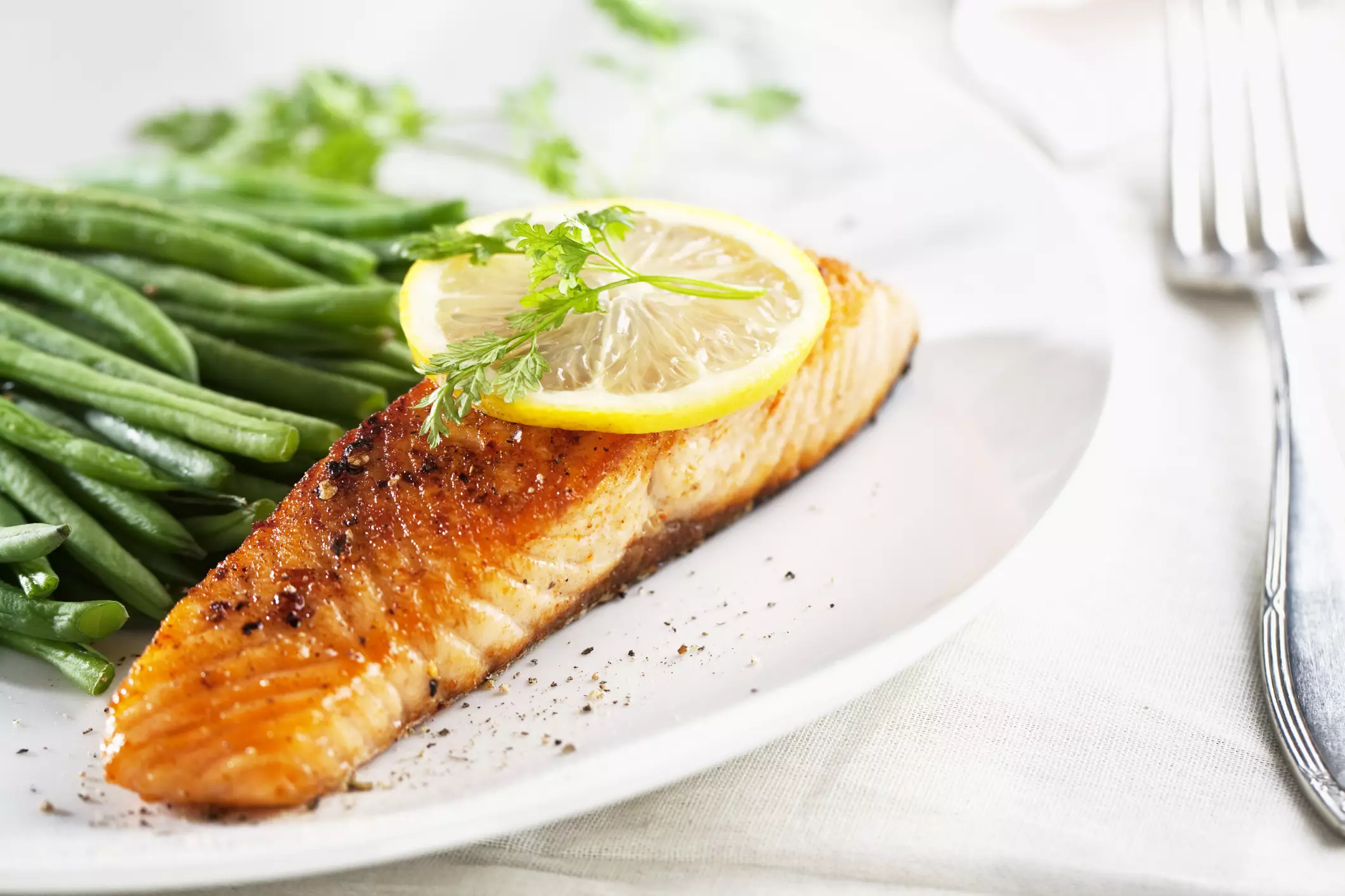 Seared salmon served with green beans